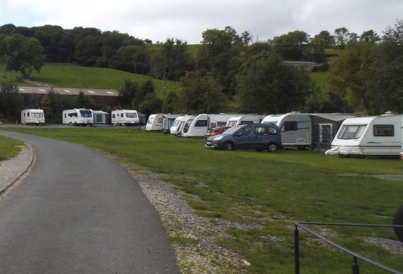 Touring caravans pitched on the caravan site in Dent
