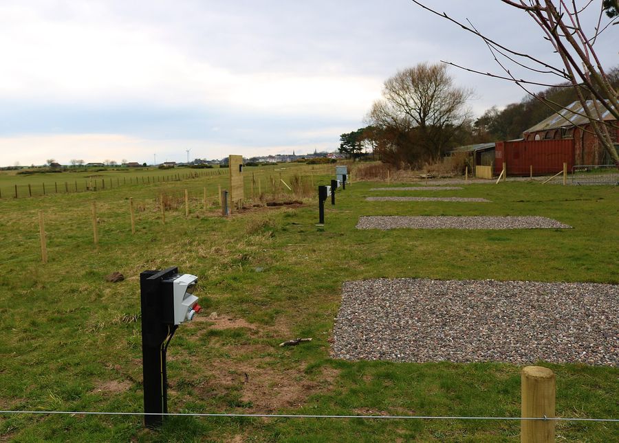 Gravel hardstanding pitches with electric hook-up posts