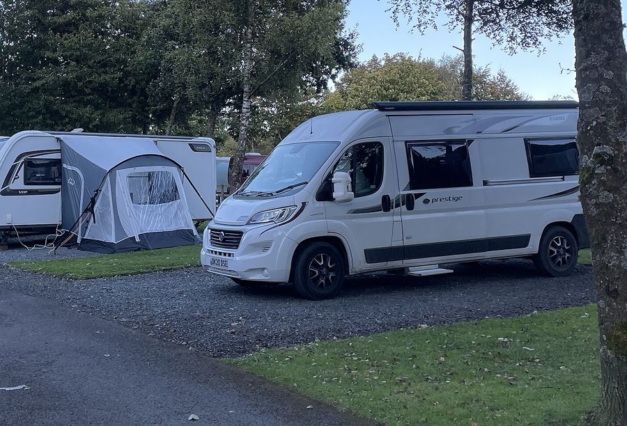 A motorhome parked on a hardstanding pitch